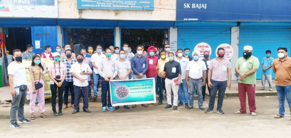 DC Dimapur, Anoop Khinchi seen along with volunteers at Dimapur on July 16. (Morung Photo)